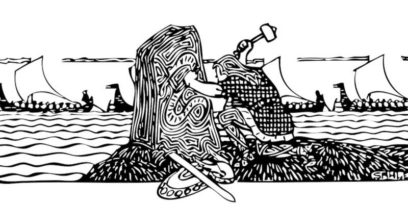 Vikingo tallando una piedra rúnica
